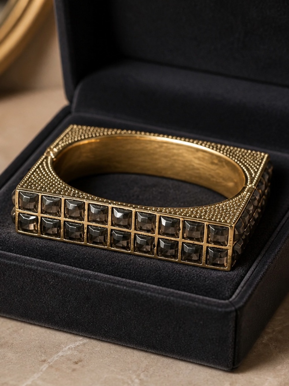 Gold Tone Square Bangle with Black Faceted Stones